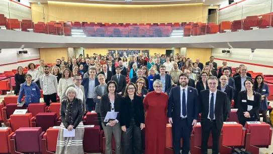 Photo de groupe de l'auditoire du RNA du 8 décembre 2025